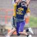 Saline High School's Zach Owings reaches out for an interception during practice at the school on Monday, August 12, 2013. Melanie Maxwell | AnnArbor.com